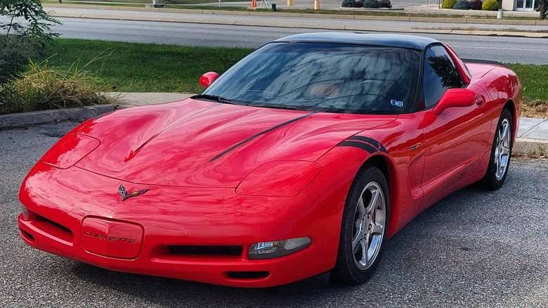 Red 2004 Chevrolet Corvette in driveway