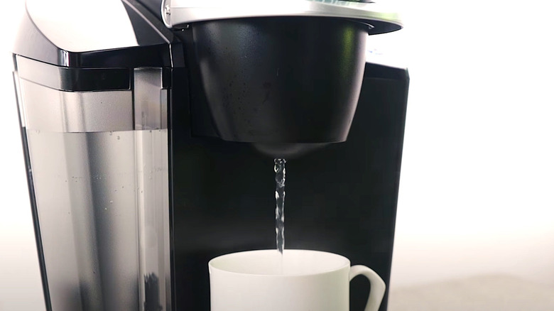 Water running through a Keurig pod coffee machine