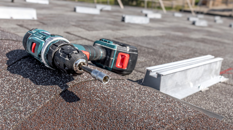 Power tool left on a rooftop in the sun