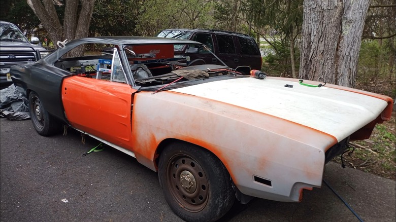 A Crown Victoria that is being converted into a 1969 Dodge Charger