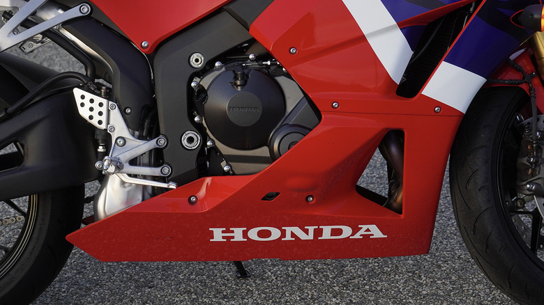 2024 Honda CBR600RR clutch cover and footpeg detail