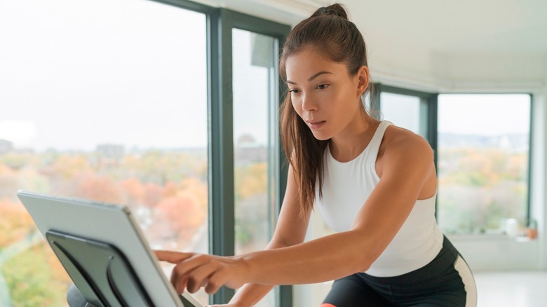 Person using exercise bike