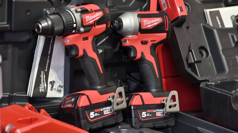 shelf stocked with Milwaukee tools