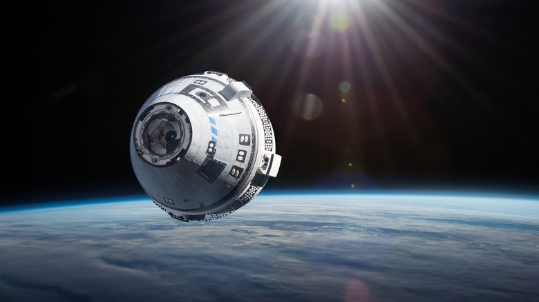 Boeing Starliner capsule in space.