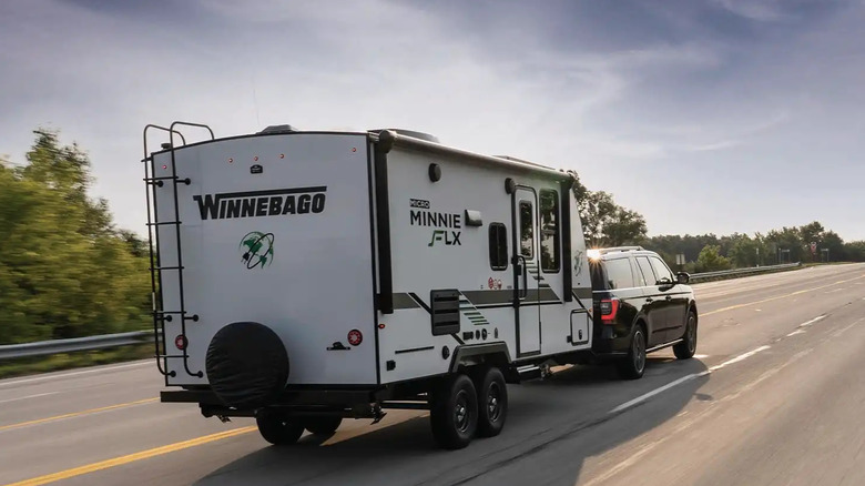 Car towing a Winnebago Micro Minnie FLX