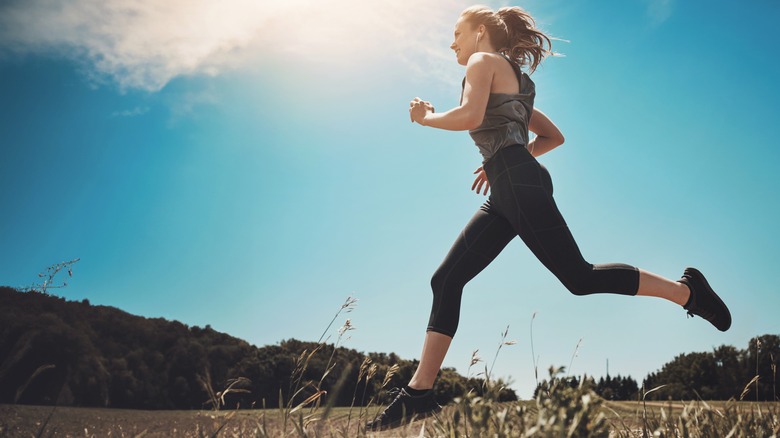 woman running on a field