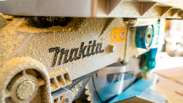 a Makita miter saw in action