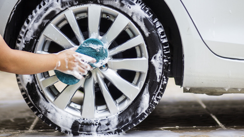 Washing the wheels of a car