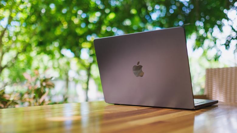 Apple Macbook sitting on a table