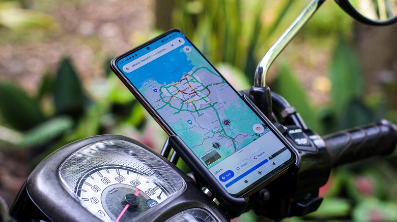 Phone mounted to motorcycle handlebars