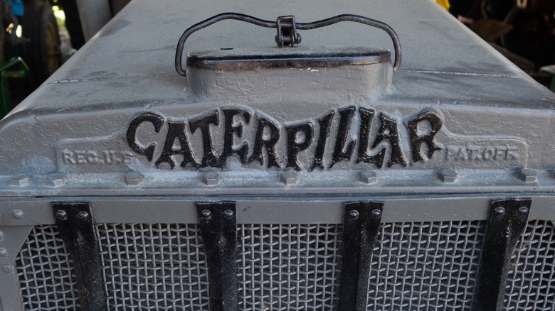 old squiggly Caterpillar company logo