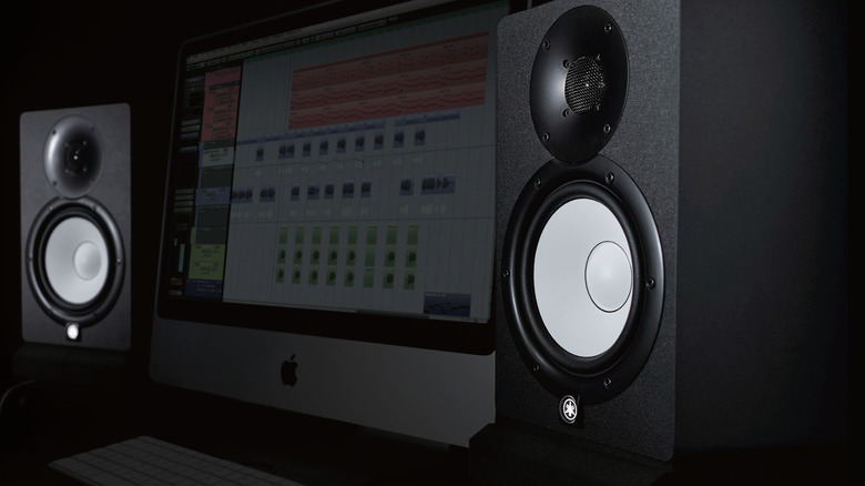 Yamaha HS7 studio monitors alongside iMac