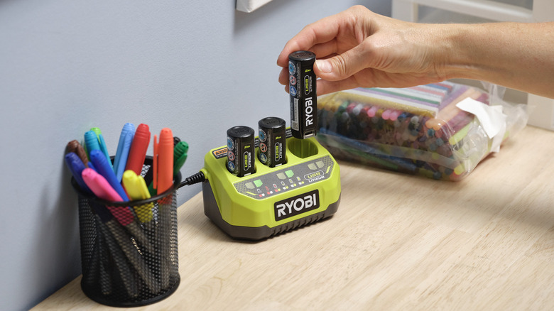 three Ryobi 4V batteries