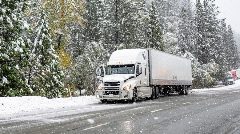 semi truck on snowy road