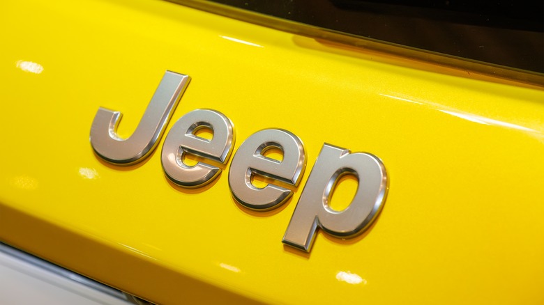 Jeep name on yellow vehicle