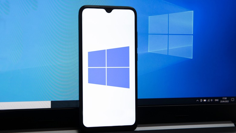 Windows logo on phone and laptop