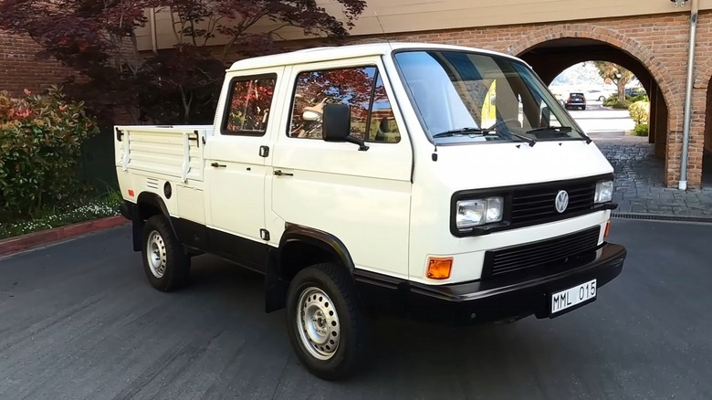 White Volkswagen Transporter T3 Syncro pickup parked