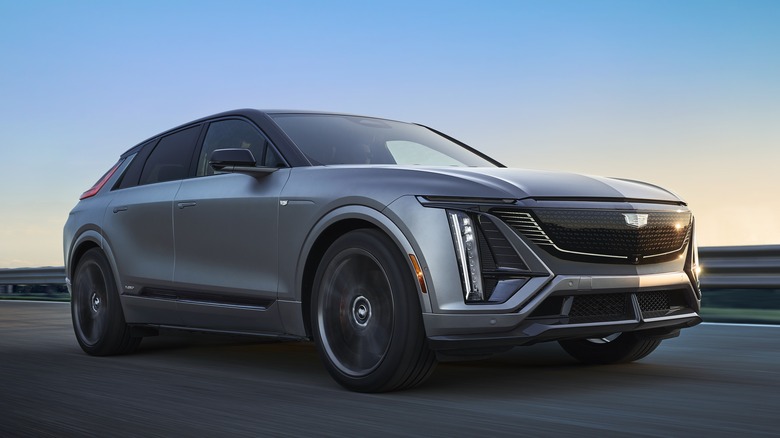 Front quarter view of a 2026 Cadillac Lyriq-V driving on a road