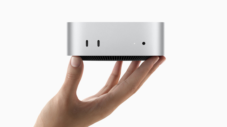 Person holding the 2024 Apple Mac Mini