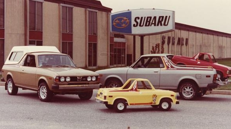 Subaru BRATs in front of Subaru dealership