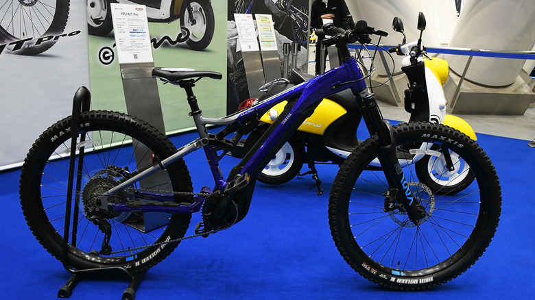 A blue Yamaha eBike on display