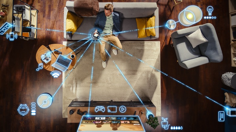 Visualization of man controlling smart home from couch