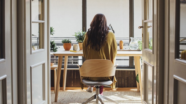 A woman sitting at a desk