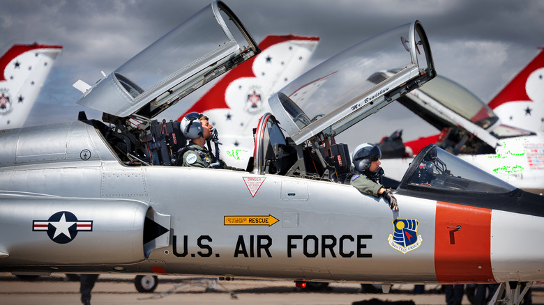 Pilots sitting in T-38 Talon cockpit