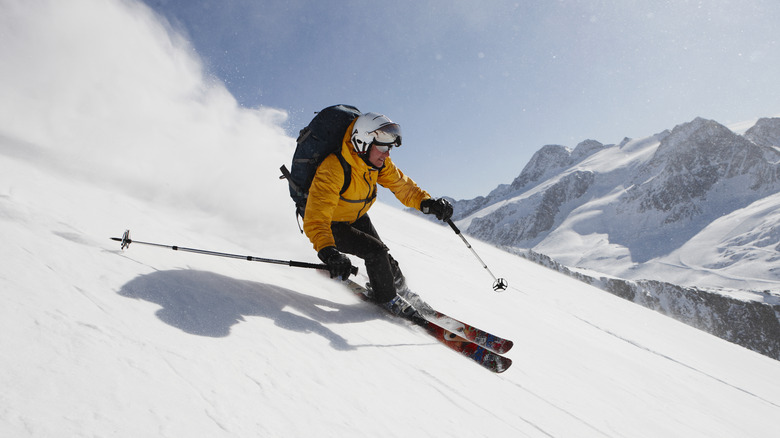 Person skiing on slopes