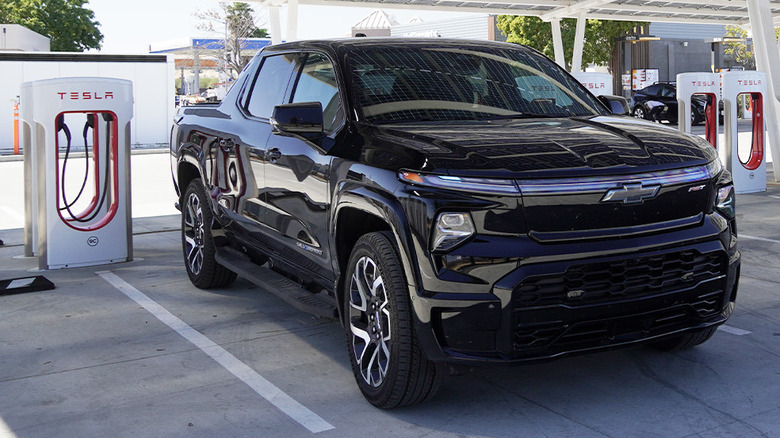 Chevrolet Silverado EV at Tesla Supercharger station