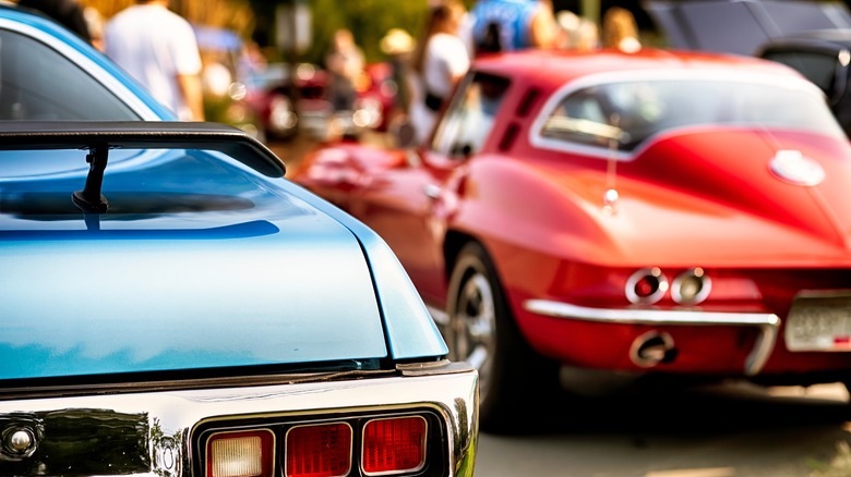 Blue and red classic cars