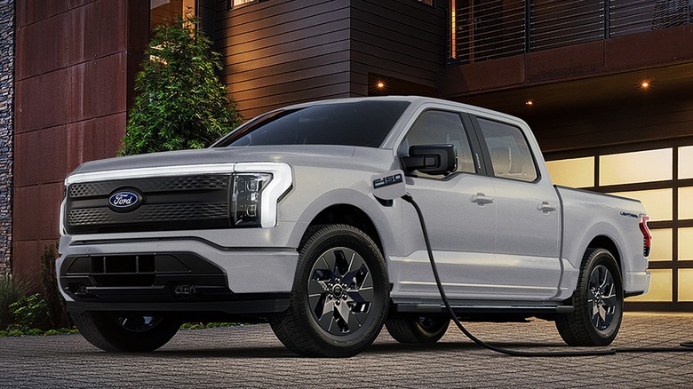 Ford F-150 Lightning charging on the driveway