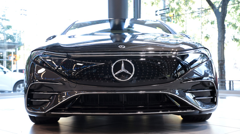 The front of an electric Mercedes car in the EQS series