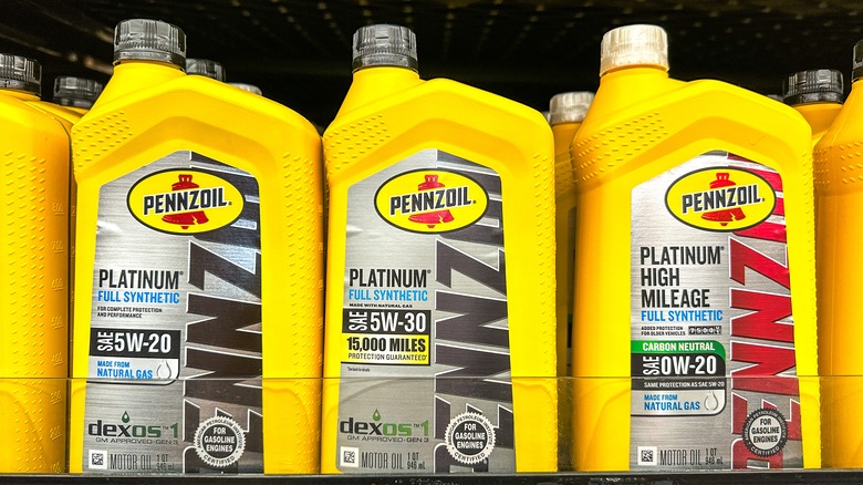 Bottles of Pennzoil High Mileage oil on store shevles