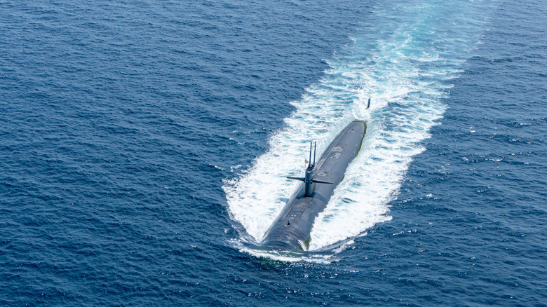 Virginia-class submarine sailing on the surface of the ocean