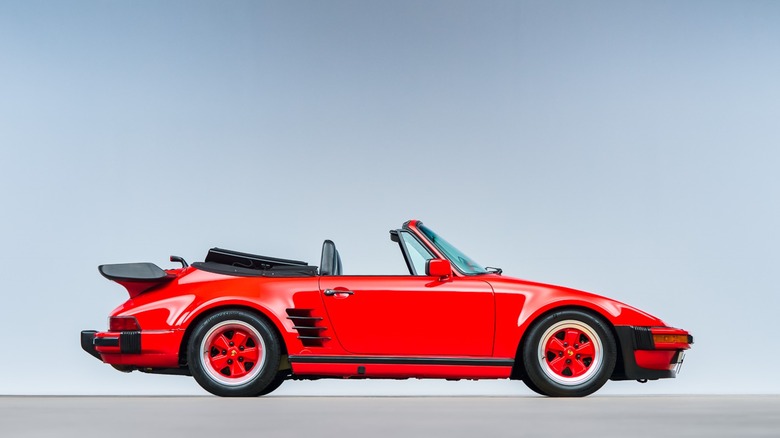 Red Porsche 930 Cabriolet Slantnose showing the front of the car at an angle