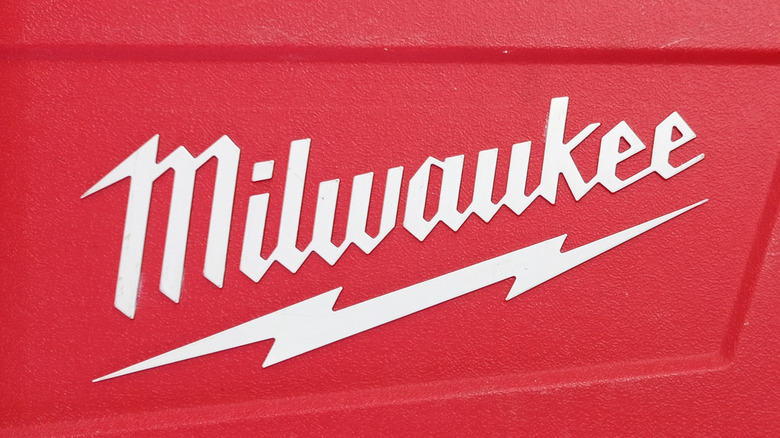 The Milwaukee logo across a red tool box.