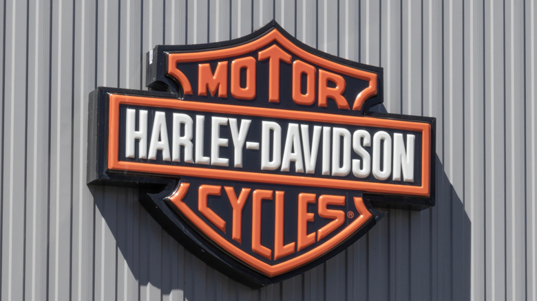 The Harley-Davidson logo on the side of a building.