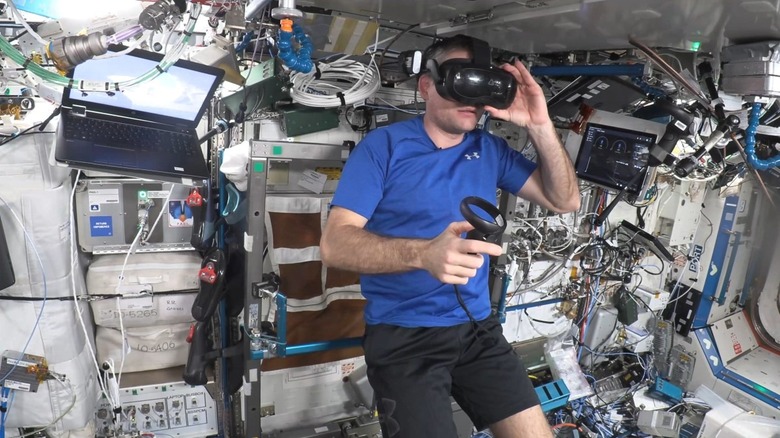 ESA astronaut wears a VR headset