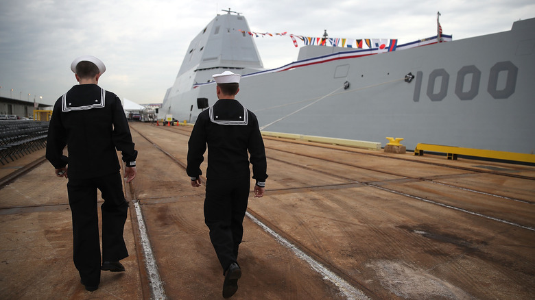 Sailors pass USS Zumwalt